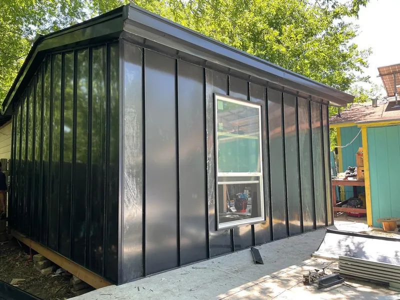 Black standing seam metal wall panels for Metal Roof Installation in Flatwoods