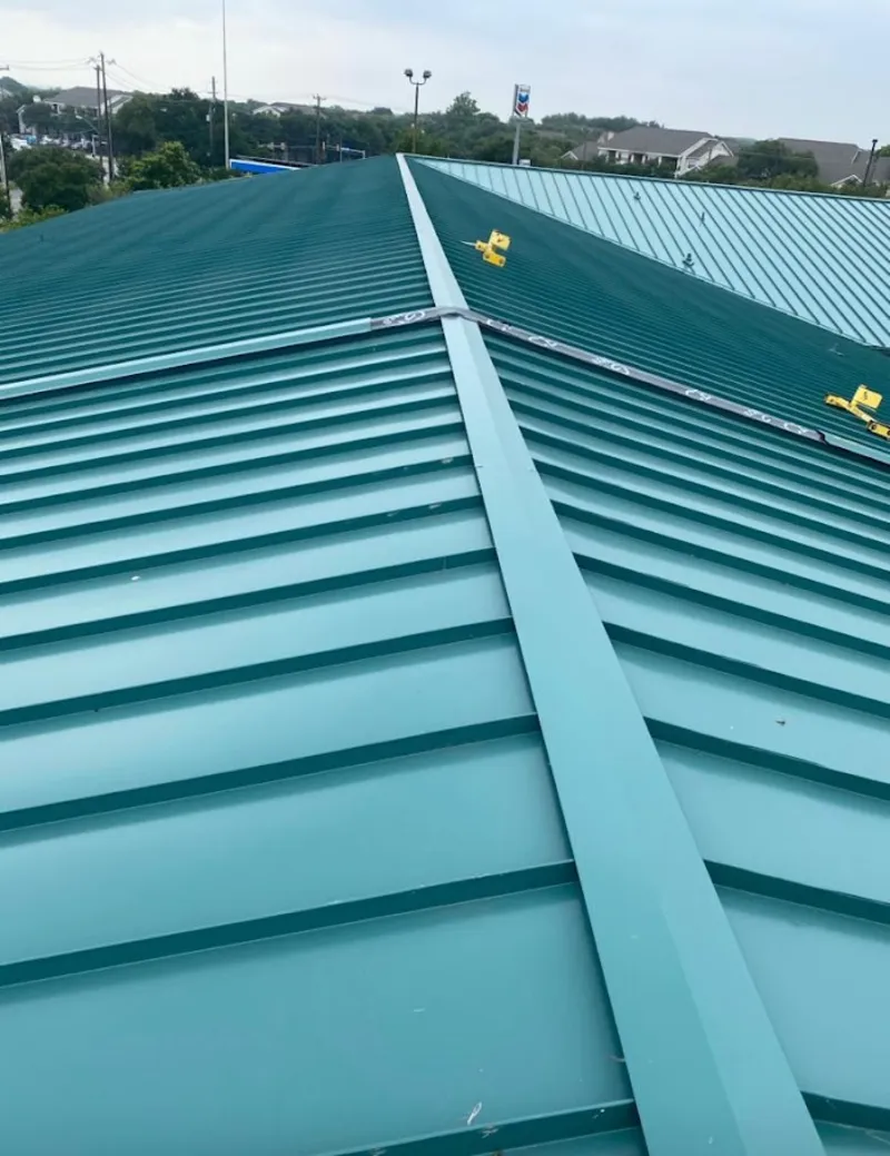 Green commercial metal roof ridge and valley for Metal Roof Repair in Flatwoods